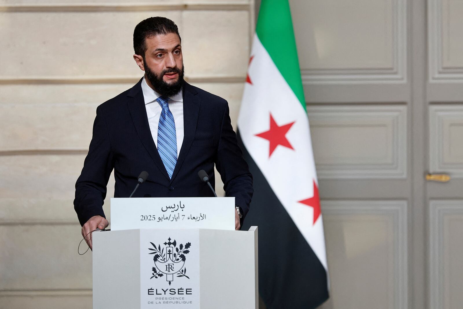 Syria's interim President Ahmad al-Sharaa, speaks during a joint press conference with French President Emmanuel Macron after a meeting at the Elysee Palace in Paris, Wednesday, May 7, 2025. (Stephanie Lecocq/Pool via AP)