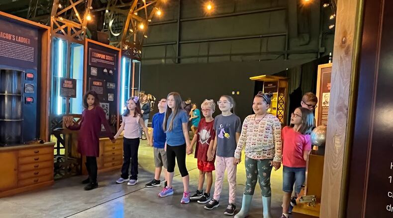Children gathered Wednesday at the National Museum of the U.S. Air Force's new walk-through exhibit, "Discover Steampunk." THOMAS GNAU/STAFF