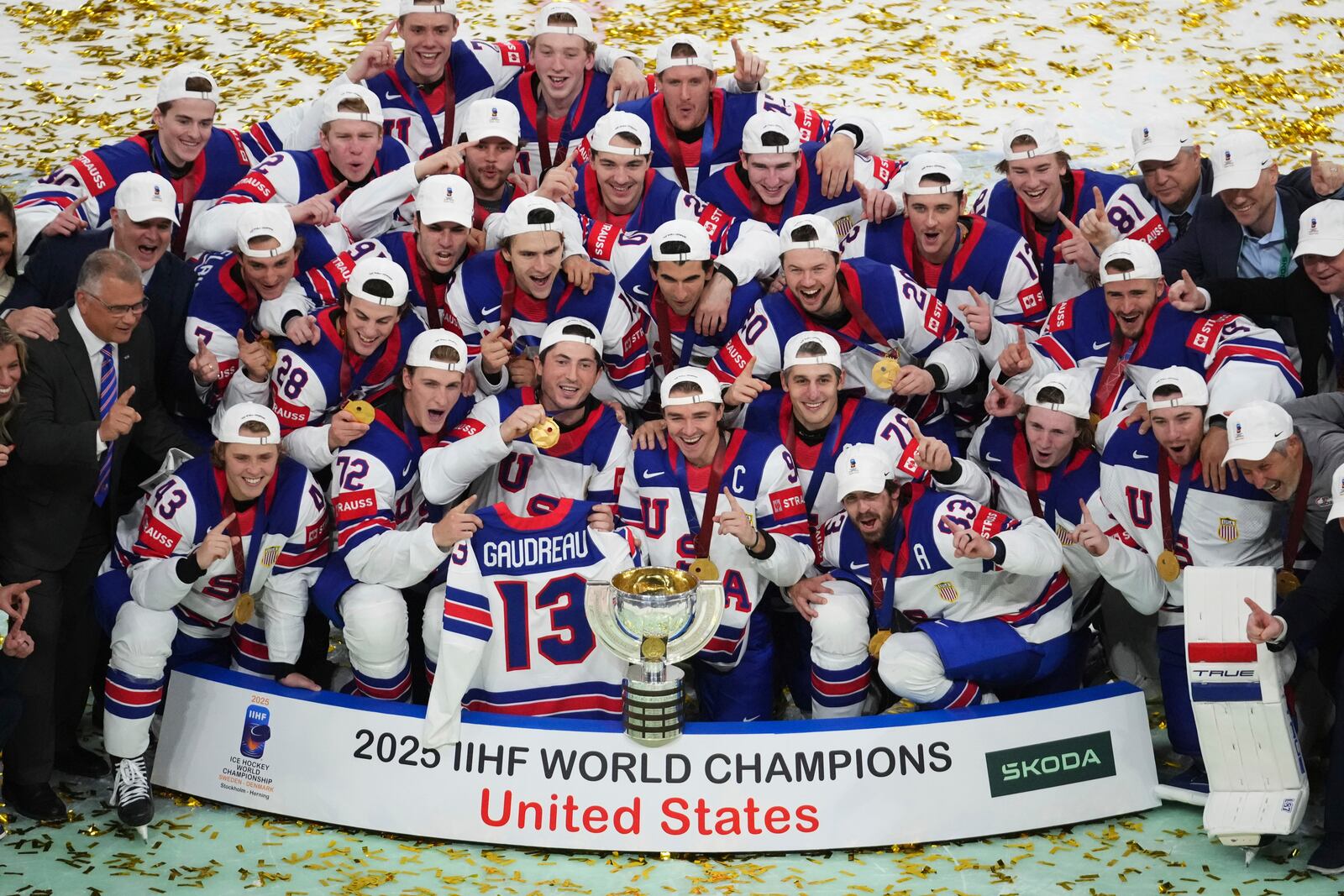 Team USA poses after winning the final match between United States and Switzerland at the ice hockey world championships in Stockholm, Sweden, Sunday, May 25, 2025. (AP Photo/Petr David Josek)