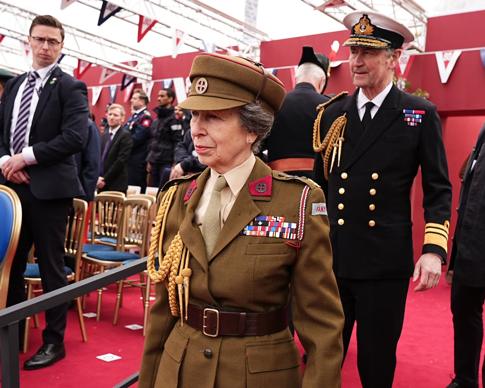 Britain's Princess Anne and Vice Admiral Sir Tim Laurence arrive for the military procession the military procession marking the 80th anniversary of VE Day, in London, Monday, May 5, 2025. (Aaron Chown/Pool Photo via AP)