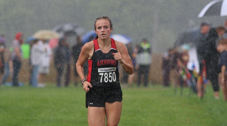 Tecumseh’s Kylee Mastin races to the finish line at the Clark County Cross Country Championships at Young’s Dairy on Tuesday, Oct. 2, 2018. Michael Cooper/CONTRIBUTED
