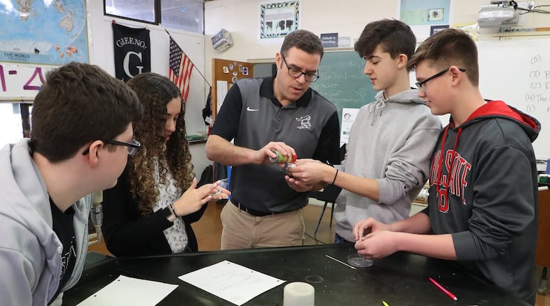 Tom Jenkins, Science/Stem teacher at Greenon Middle/High School, was one of four teachers chosen to receive the Excellence in Teaching Award at the Springfield Rotary Club meeting on March 16. He is now one of four state finalist to be recognized as Ohio's Teacher of the Year for 2021. BILL LACKEY/STAFF