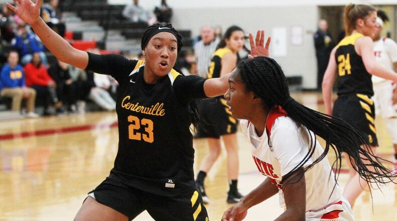 Bree Hall of Wayne (with ball) is checked by Cotie McMahon of Centerville. Wayne defeated visiting Centerville 56-37 in a GWOC girls high school basketball game on Wednesday, Dec. 11, 2019. MARC PENDLETON / STAFF