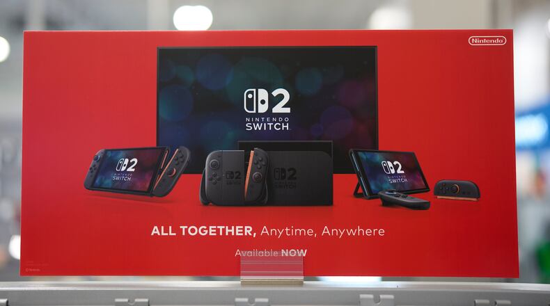 A Nintendo Switch 2 display appears at a Best Buy in Nashville, Tenn., on une 5, 2025, (AP Photo/George Walker IV)