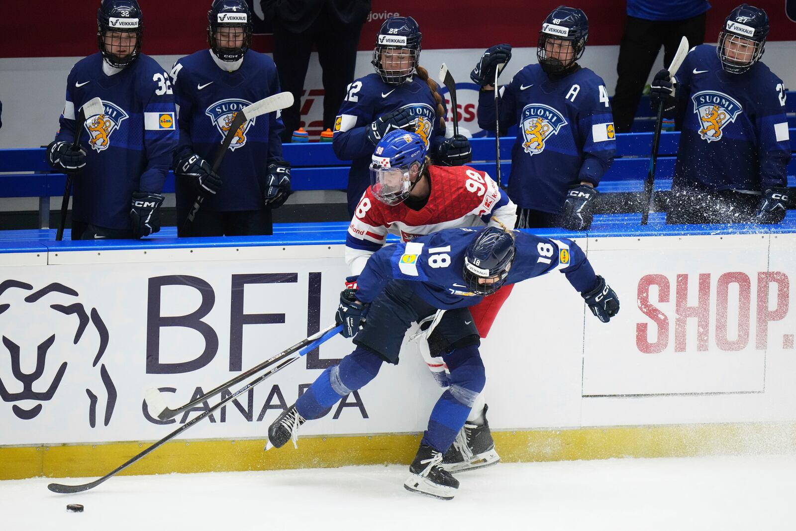 Finland's Jenniina Nylund, right, challenges Kristyna Kaltounkova of Czech Republic during the bronze medal match between Czech Republic and Finland at the Women's Ice Hockey Championships in Ceske Budejovice, Czech Republic, Sunday, April 20, 2025. (AP Photo/Petr David Josek)