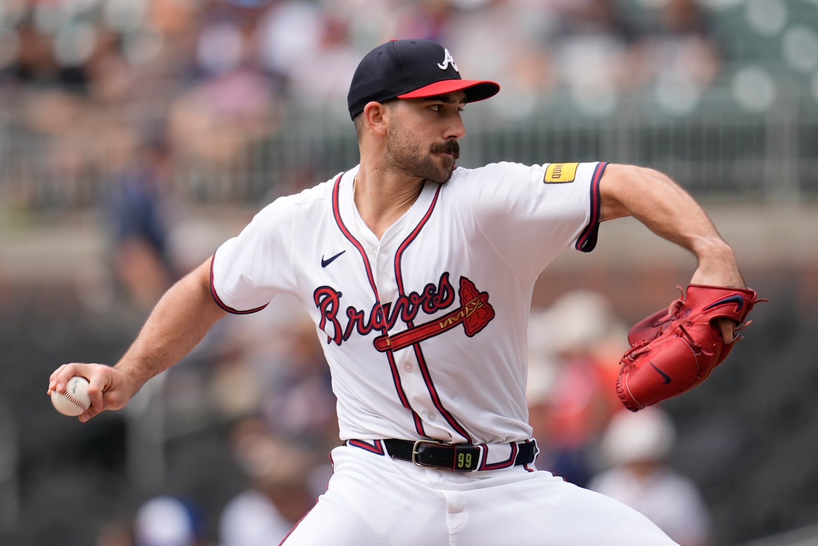 Atlanta Braves pitcher Spencer Strider (99) works against the San Francisco Giants in the first inning of a baseball game, Wednesday, July 23, 2025, in Atlanta. (AP Photo/Mike Stewart)