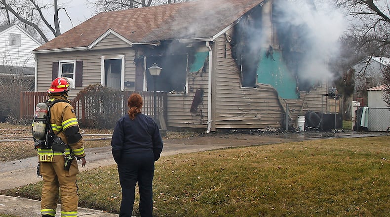 A fire caused extensive damage to a house in the 2000 block of Leland Drive Friday, Feb. 2, 2024. The Springfield Fire Rescue Division arrived to find smoke and flames coming from the front and right side of the structure. The house was a vacant rental property and the Fire Marshal was called to determine a cause for the fire. The fire department was able to keep the fire from damaging the surrounding houses. BILL LACKEY/STAFF