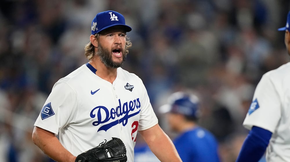 FILE - Los Angeles Dodgers pitcher Clayton Kershaw celebrates the end of the top of the 12th inning against the Toronto Blue Jays in Game 3 of baseball's World Series, Monday, Oct. 27, 2025, in Los Angeles. (AP Photo/Brynn Anderson, File)