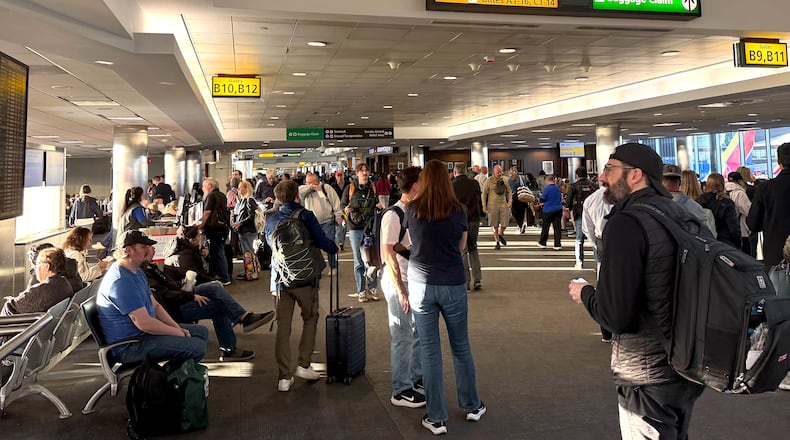 Stranded travelers crowd the Southwest domestic terminal at Baltimore-Washington International Thurgood Marshall Airport on Friday, March 13, 2026, after a ground stop. (Ellie Wolf/The Baltimore Banner via AP)