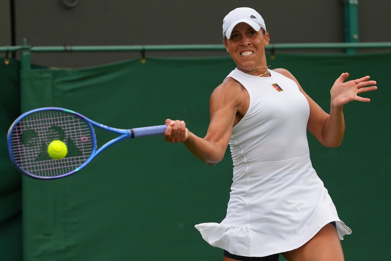 Madison Keys of the U.S. returns to Olga Danilovic of Serbia during their second round singles match at the Wimbledon Tennis Championships in London, Wednesday, July 2, 2025. (AP Photo/Joanna Chan)