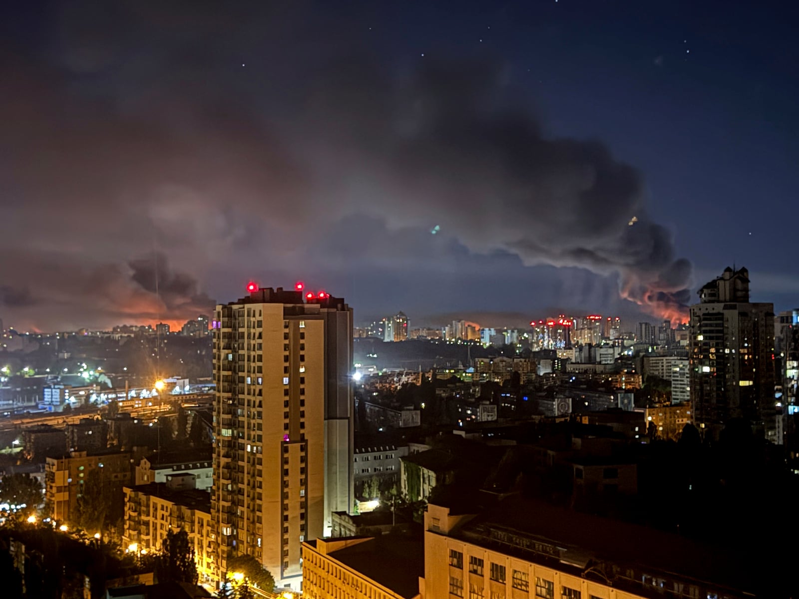 Smoke rises after a Russian strike on Kyiv, Ukraine, on Friday, July 4, 2025. (AP Photo/Yehor Konovalov)