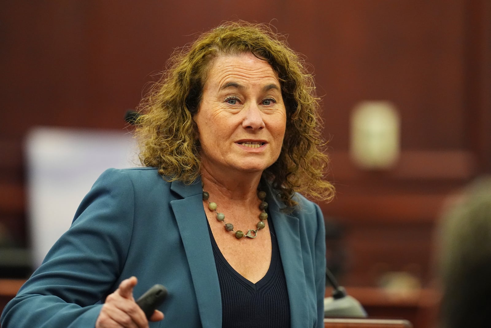 Defense attorney Lisa Moses makes a point during closing arguments in the murder trial of dentist James Craig, who is accused of killing his wife, in district court in Arapahoe County Tuesday, July 29, 2025, in Centennial, Colo. (AP Photo/David Zalubowski, Pool)