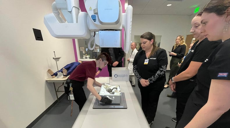 The Clark County Historical Society’s “Fiji (Feejee) Mermaid” artifact was taken to Northern Kentucky University on Oct. 13 to get an x-ray and CT scan to see what it is made of. Radiology students seemed certain the scales on the tail are fish scales and the jaw appears to be a fish bone jaw. They determined there are wooden rods holding it together through the middle, metal, and cotton stuffing in the body cavity, along with some sort of paper mâché holding it all together. It will now be sent to the Cincinnati Zoo and Newport Aquarium to see if they can provide more definitive information about the specific makeup of the artifact. Contributed