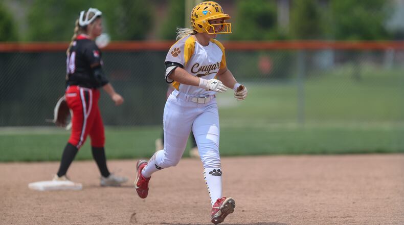 Kenton Ridge High School senior Kirsten Wright celebrates after hitting a home run during a Division II district final game against Franklin on Friday, May 19 at Arcanum High School. The Cougars won 11-0 in five innings. CONTRIBUTED PHOTO BY MICHAEL COOPER