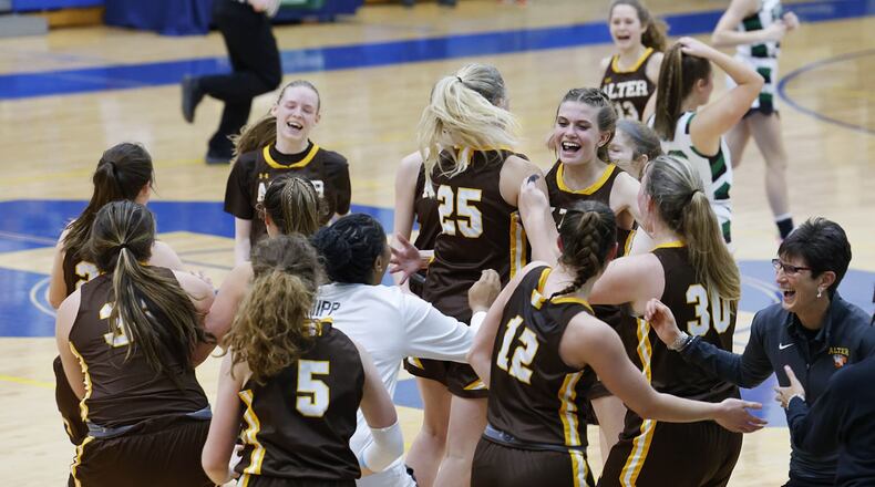 Archbishop Alter celebrates as they defeat Badin 45-35 in their girls Division II regional final basketball game Friday, March 4, 2022 at Springfield High School in Springfield. NICK GRAHAM/STAFF