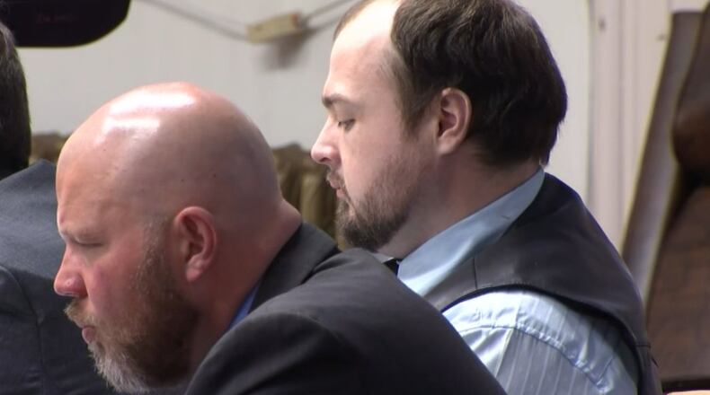 George Wagner IV, wearing a vest, sits next to his attorneys during his Pike County murder trial as it enters Week 6 on Oct. 17, 2022. Wagner faces charges in the execution-style deaths of eight members of the Rhoden family in 2016. COURTNEY FRANCISCO/WCPO