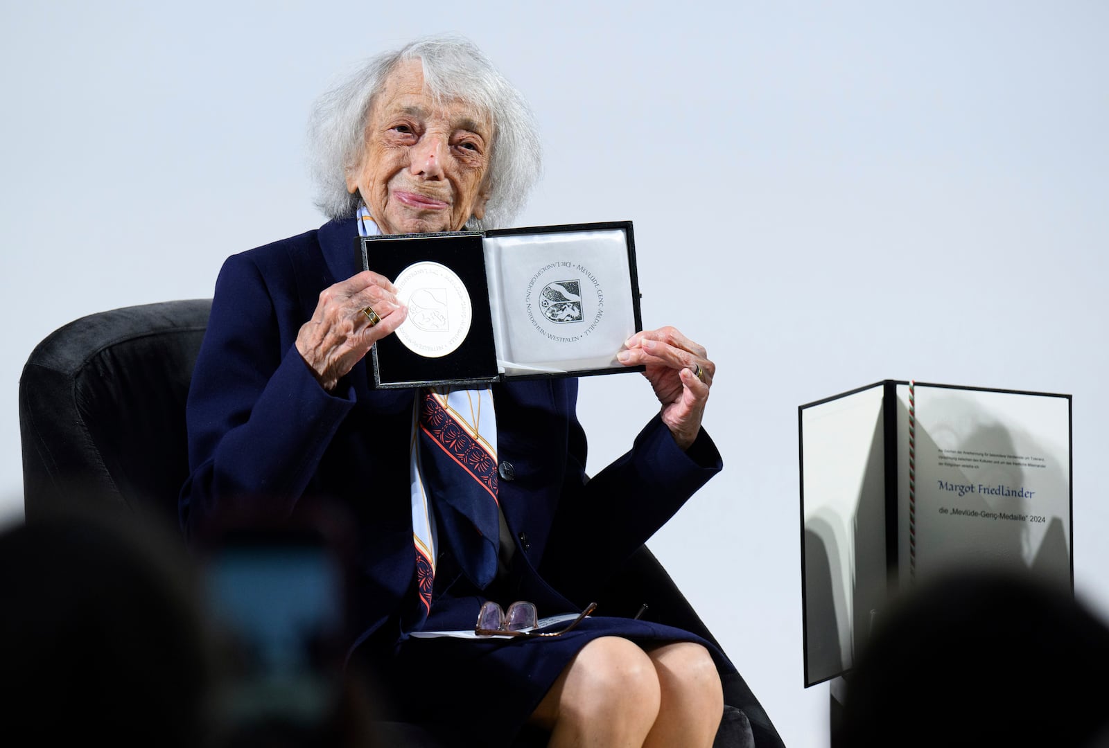FILE - Margot Friedlander shows the Mevlude Genc Medal after it was awarded to her, at the Bode Museum in Berlin, Tuesday June 4, 2024. (Bernd von Jutrczenka/dpa via AP, File)