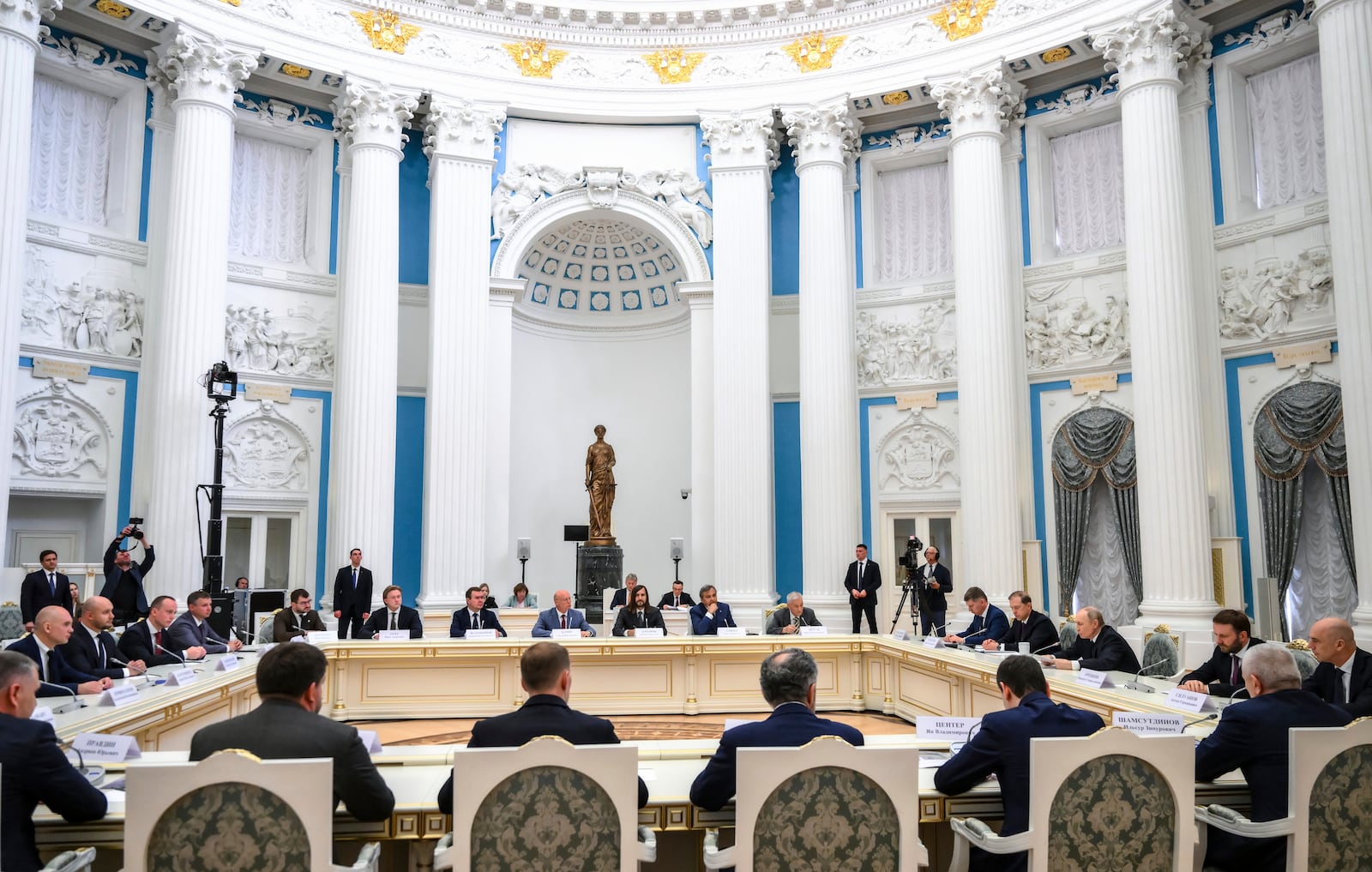 FILE - Russian President Vladimir Putin, fourth right, speaks during a meeting with members of Russia's business community at the Kremlin in Moscow, Russia, Monday, May 26, 2025. (Grigory Sysoyev, Sputnik, Kremlin Pool Photo via AP, File)