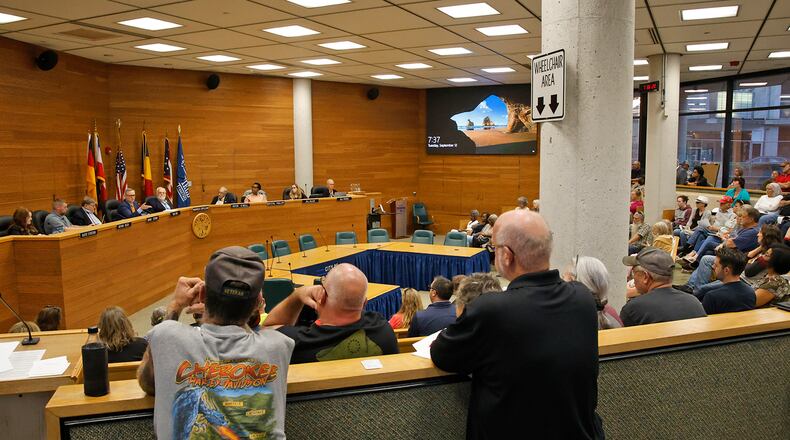 “More people are attending and wanting to express their concerns and voice their opinions. Citizen feedback is positive and we want to encourage it,” Springfield Mayor Rob Rue said. 
This is the crowded Springfield City Commission meeting on Tuesday, Sept. 13, 2023. BILL LACKEY/STAFF