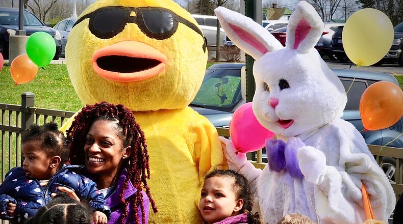 Quackers the duck, the United Rehabilitation Services mascot, and the Easter Bunny helped with a balloon release and an Easter egg hunt Friday April 7, 2023 at URS of Dayton. URS offers programs to address the physical, social, and emotional needs of children, adults and seniors with developmental or acquired disabilities. MARSHALL GORBY \STAFF