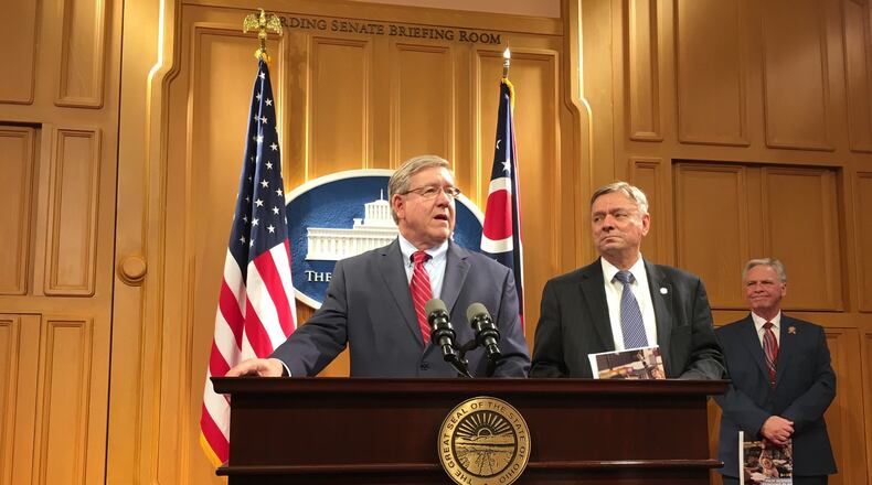State Reps. Bob Cupp (left) and John Patterson announce a school funding plan March 25, 2019, after more than a year of work by a committee of educators, politicians and others. LAURA A. BISCHOFF / STAFF