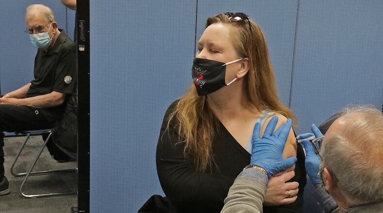 Several Champaign County school districts will receive the coronavirus vaccine on Friday. BILL LACKEY/STAFF