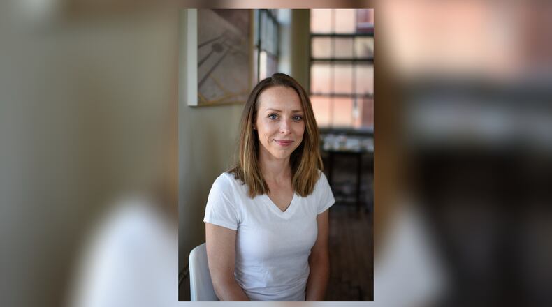 Springfield artist Kelley Booze is one of 75 state residents to receive the Ohio Arts Council Individual Excellence Award, worth $4,000. Booze's work can be see at the Hatch Artist Studios where she has a space. She also teaches at the Springfield Museum of Art and with Project Jericho. Photo by LAUREN HOUSER/SUBMITTED