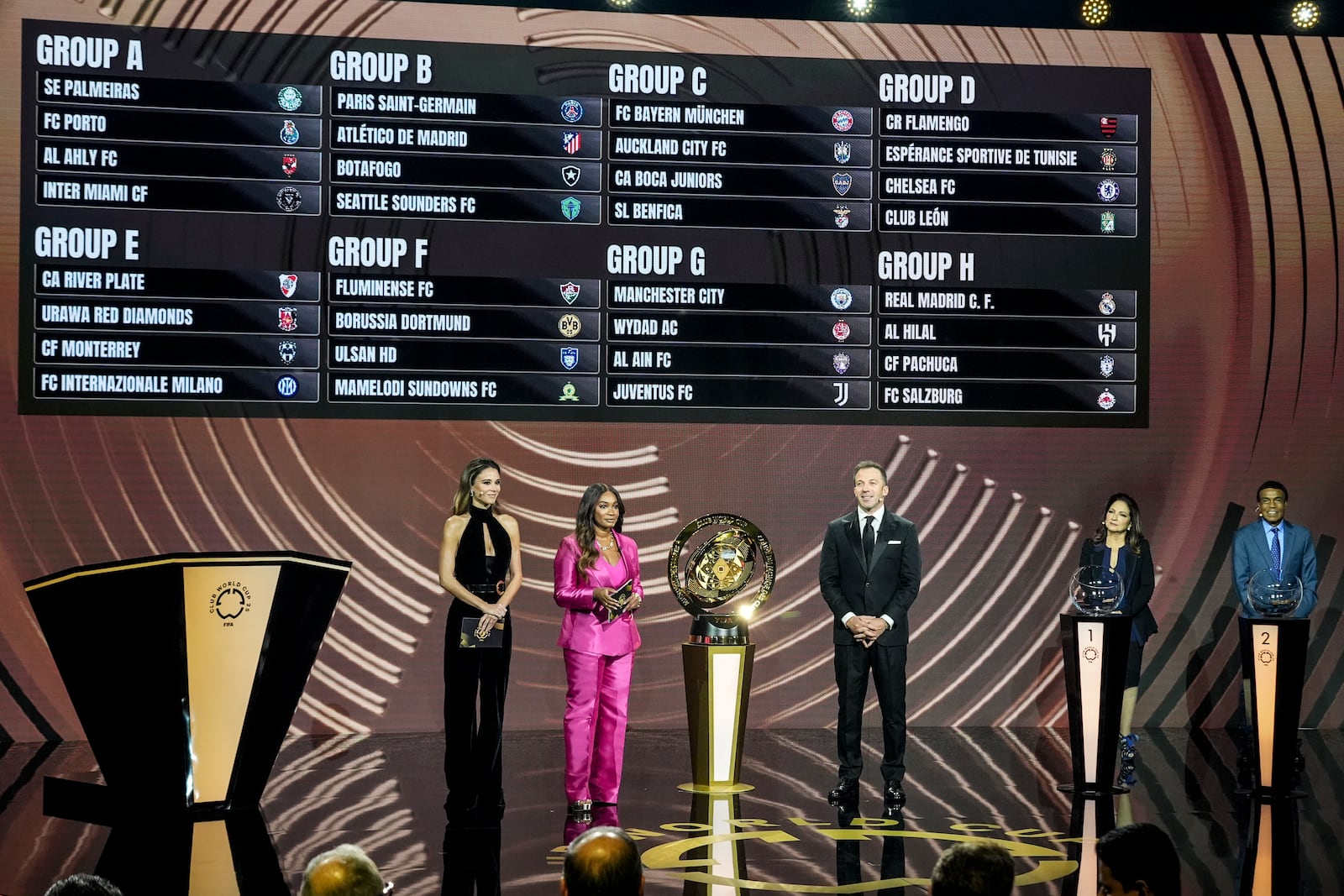 FILE - Presenter Samantha Johnson speaks on stage during the draw for the 2025 FIFA Club World Cup soccer tournament, Thursday, Dec. 5, 2024, in Miami. (AP Photo/Rebecca Blackwell, File)