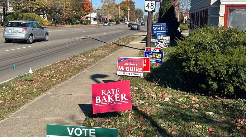 Political campaign signs line the edge of Far Hills Avenue in Kettering in front of a vacant business on Saturday, Nov. 2, 2024. JEREMY P. KELLEY / STAFF