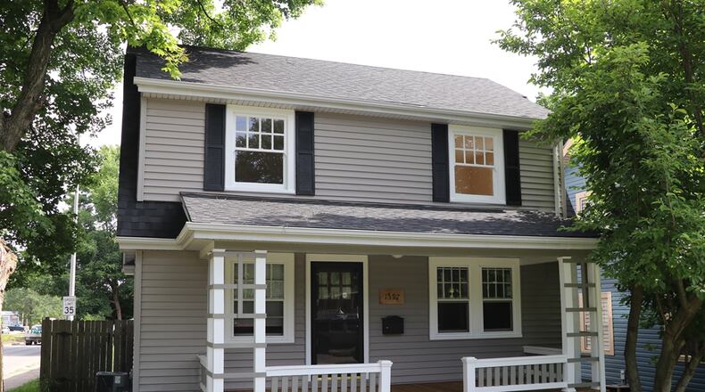 Listed for $249,900, the vinyl-sided, two-story residence at 1597 Constance Ave. has about 1,488 square feet of living space. KATHY TYLER / CONTRIBUTED PHOTOS