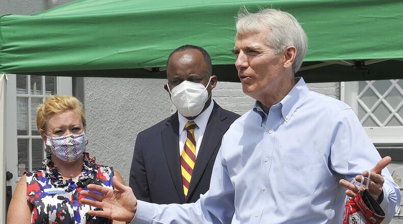 U.S. Sen. Rob Portman, R-Ohio, spoke Friday while visiting the Charles Young Buffalo Soldiers National Monument near Xenia. MARSHALL GORBY / STAFF