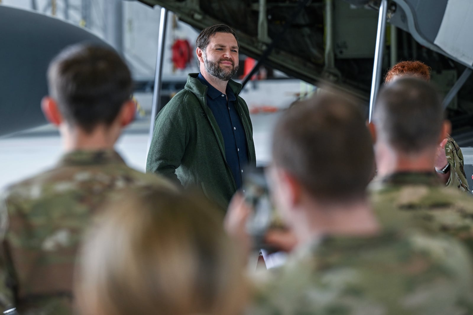 U.S. Vice President JD Vance visits with service members during a refueling stop at Ramstein Air Base,, Germany, Thursday April 24, 2025. (Kenny Holston/Pool Photo via AP)