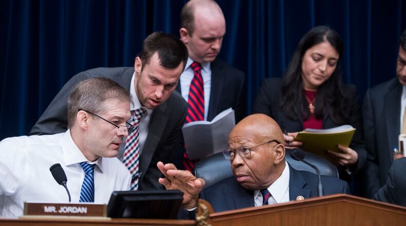 Reps. Jim Jordan and Elijah Cummings. Photo: Tom Williams/Getty Images