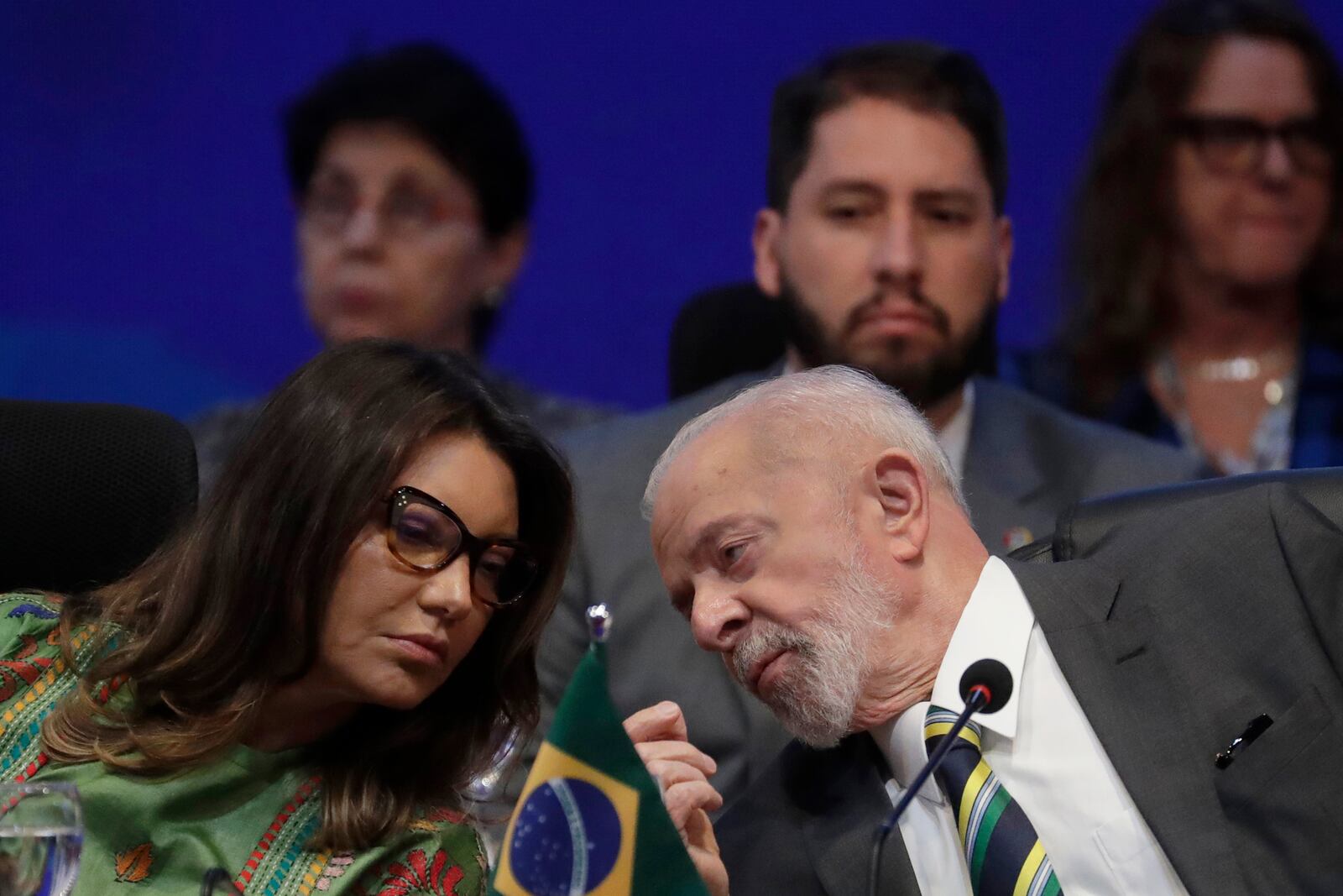 FILE - Brazil's President Luiz Inacio Lula da Silva leans over to talk with first lady Rosangela da Silva, during the opening event of the Global Alliance Against Hunger and Poverty meeting, on the sidelines of the G20 Ministerial Meetings in Rio de Janeiro, July 24, 2024. (AP Photo/Bruna Prado, File)