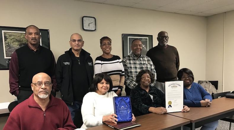 Members of the NAACP Springfield Chapter gather around their diversity and inclusion award from Clark Sate Community College.
