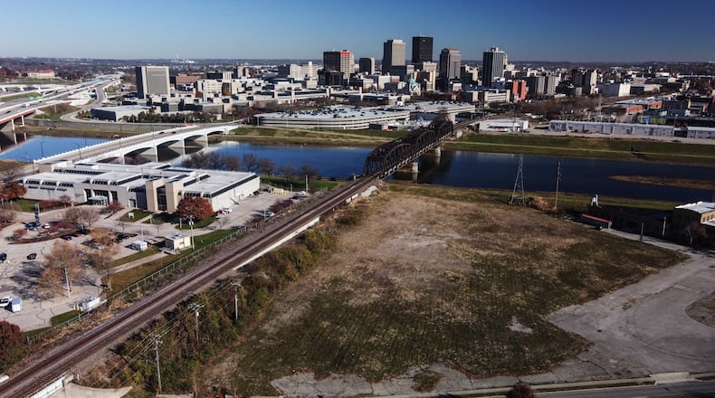 This brown field at 345 South Edwin C. Moses Blvd. in Dayton was the home to Howard Paper Mill years ago. The land has been vacant since the 1990s. JIM NOELKER/STAFF