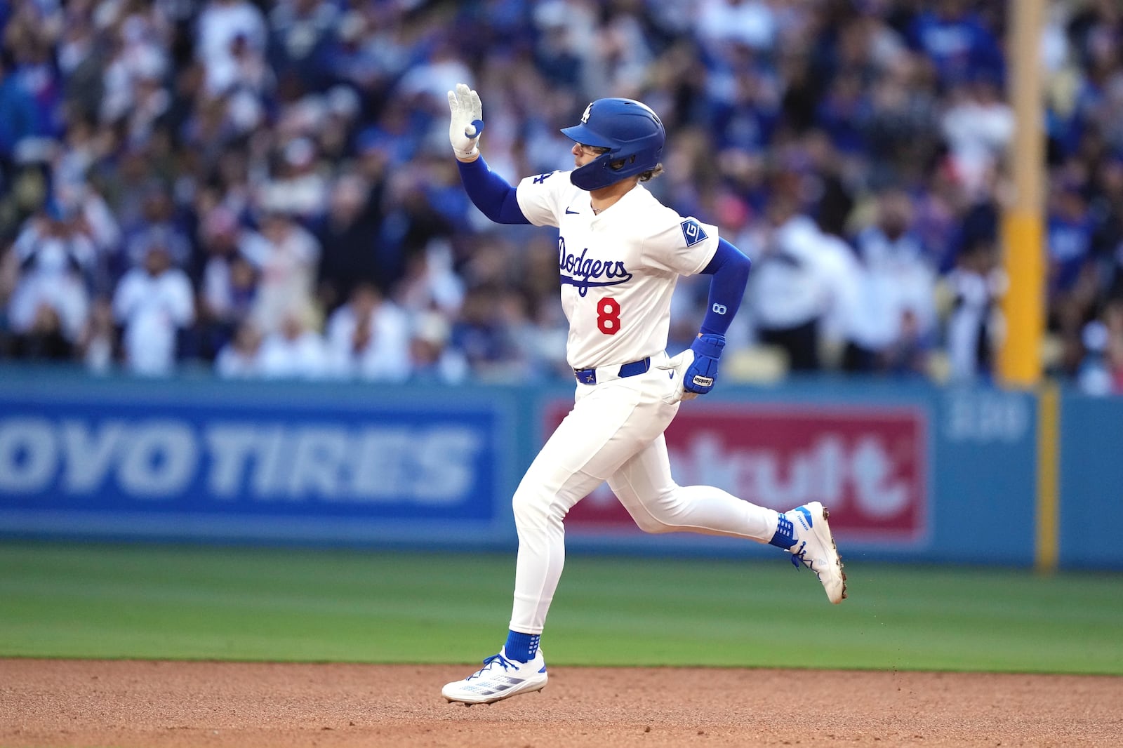 Los Angeles Dodgers' Kiké Hernández gestures as he heads to second after hitting a solo home run during the fourth inning of a baseball game against the Los Angeles Angels, Saturday, May 17, 2025, in Los Angeles. (AP Photo/Mark J. Terrill)