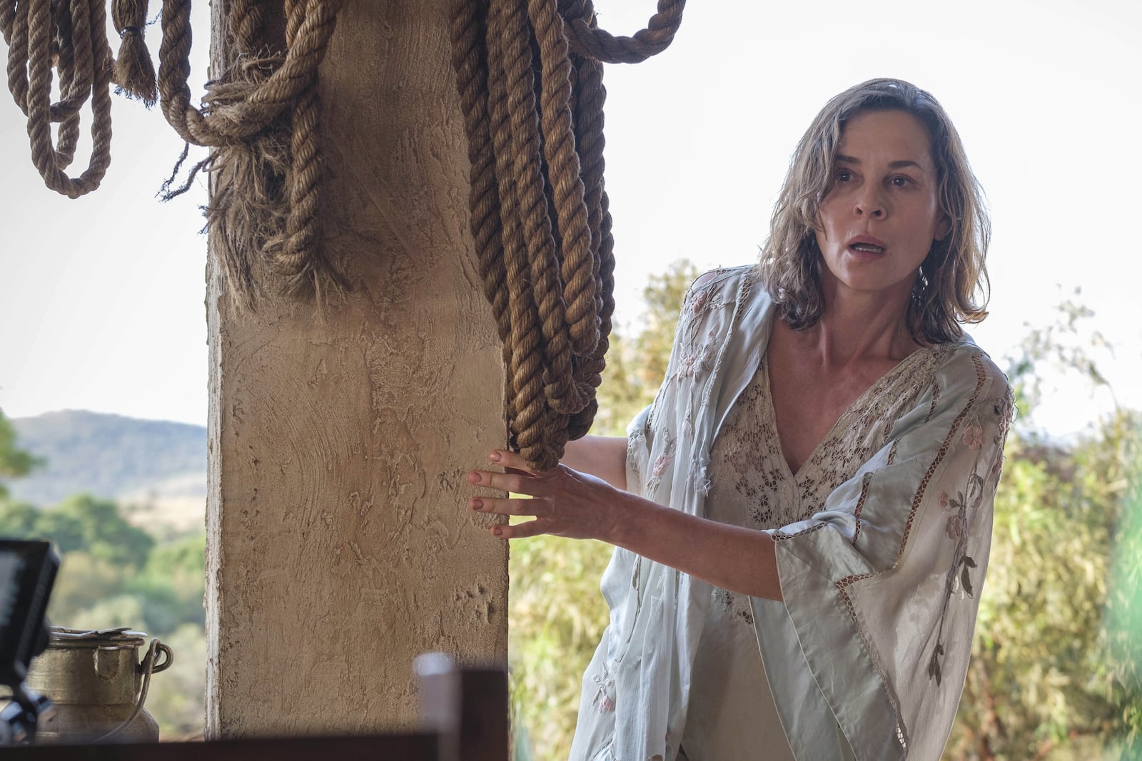 This image released by Sony Pictures Classics shows Embeth Davidtz in a scene from "Don’t Let’s Go to the Dogs Tonight." (Coco Van Oppens/Sony Pictures Classics via AP)