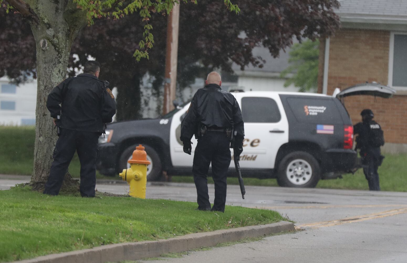 PHOTOS: Standoff on West Perrin Avenue