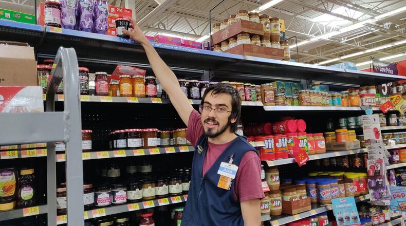 Jacob Cotton, 21, works at Walmart. He’s participating in the Live Better U education program that offers several college degrees for $1 per day.