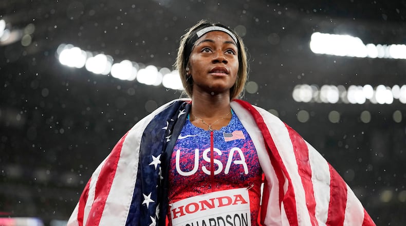 FILE - United States' Sha'Carri Richardson looks on after winning the gold medal in the women's 4 X 100 meters relay at the World Athletics Championships in Tokyo, Sept. 21, 2025. (AP Photo/Matthias Schrader, File)