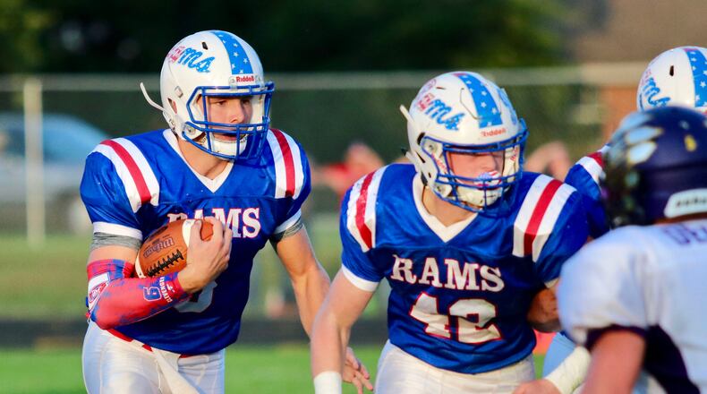 Greeneview High School quarterback Nick Clevinger runs the ball during the Rams game against Mechanicsburg in Jamestown on Friday night. The Indians won 7-0. Michael Cooper/CONTRIBUTED
