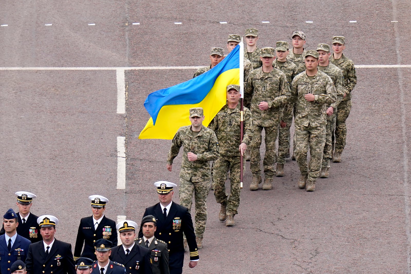 Members of the Ukrainian Armed Forces march, during the VE Day 80th anniversary parade, in London, Monday, May 5, 2025. (Andrew Matthews/Pool Photo via AP)
