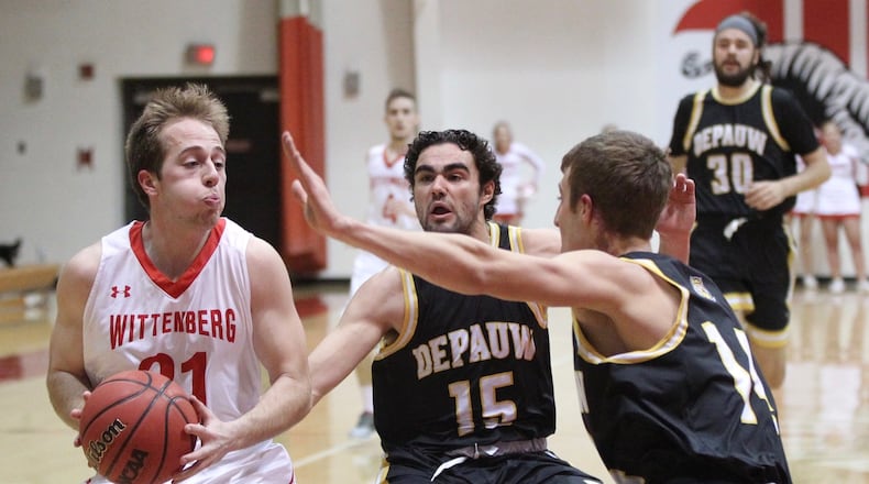 Wittenberg’s Jordan Welch drives to the basket against DePauw on Wednesday, Jan. 24, 2018, at Pam Evans Smith Arena in Springfield. David Jablonski/Staff