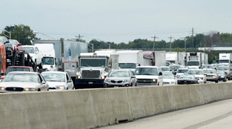 Interstate 75 was shut down in the northbound lanes between Ohio 63 and Ohio 122 due to a shooting incident Friday, Sept. 12, 2014. GREG LYNCH / STAFF