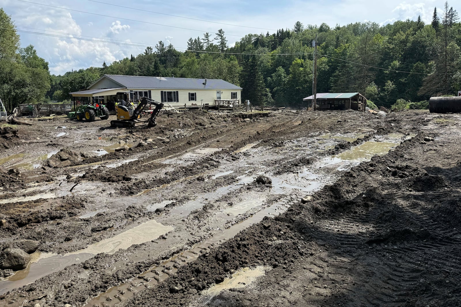 Damage from flash floods is shown at the home of Michelle Tanner, Friday, July 11, 2025 in Sutton, Vt. (AP Photo/Amanda Swinhart)