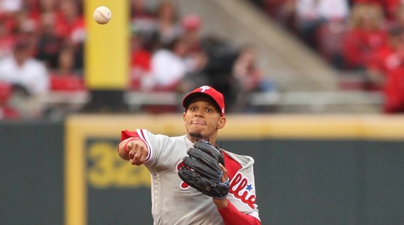 Phillies shortstop Freddy Galvis throws to first for an out against the Reds on Monday, April 3, 2017, at Great American Ball Park in Cincinnati. David Jablonski/Staff