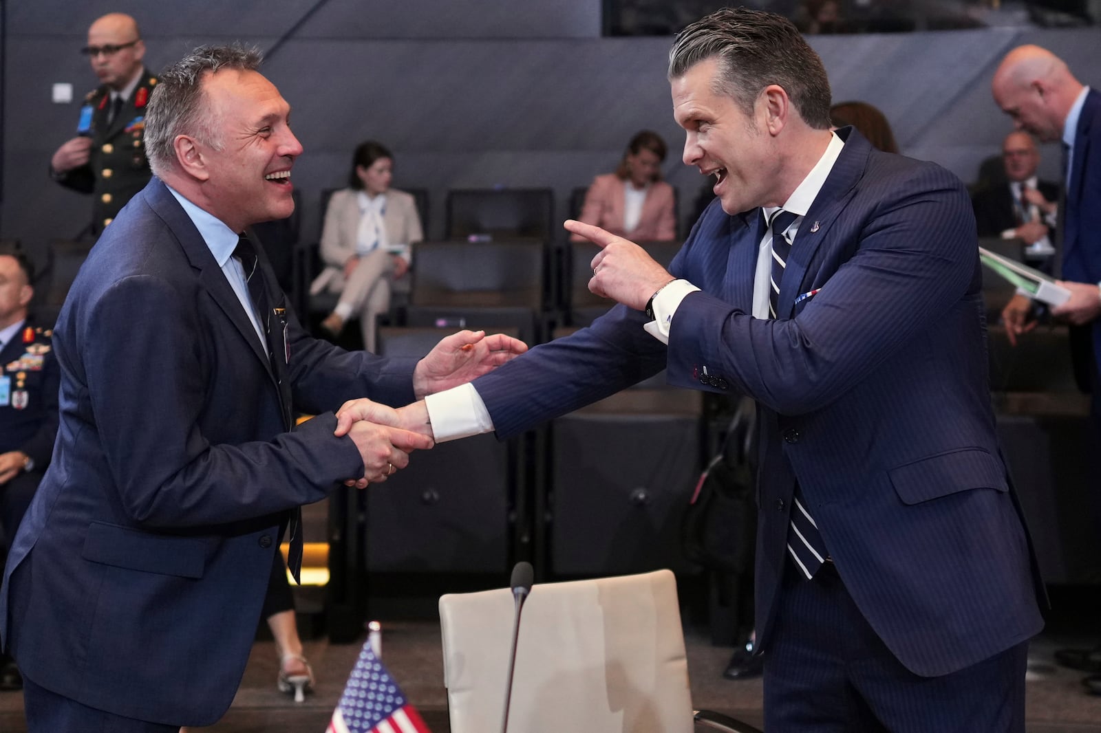 Defense Secretary Pete Hegseth, right, speaks with Norway's Defense Minister Tore Sandvik during a meeting of NATO defense ministers at NATO headquarters in Brussels, Thursday, June 5, 2025. (AP Photo/Virginia Mayo)
