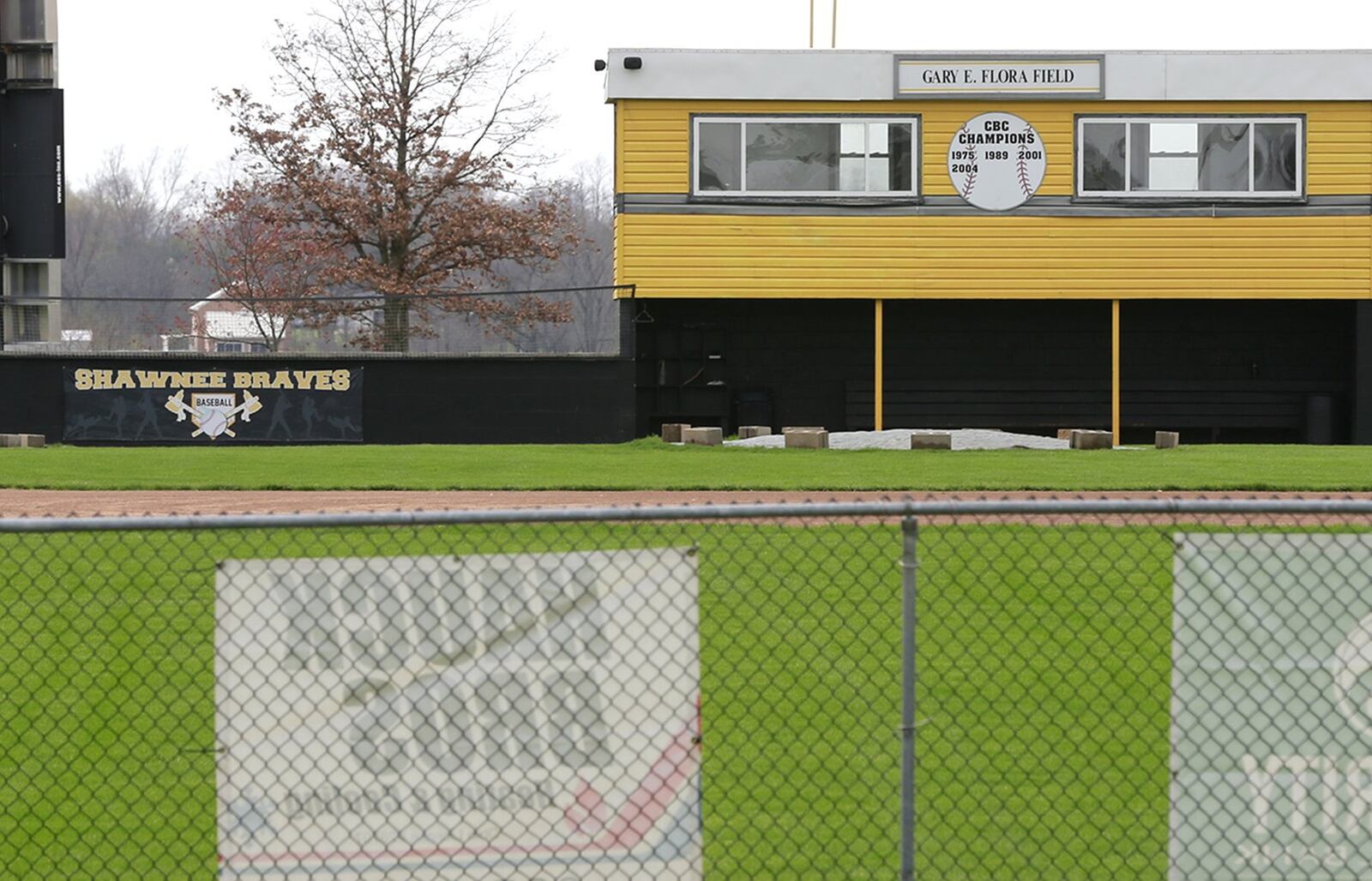 Gary E. Flora Field at Shawnee High School sits empty Tuesday afternoon after the school district cancelled Tuesday’s game. Bill Lackey/Staff