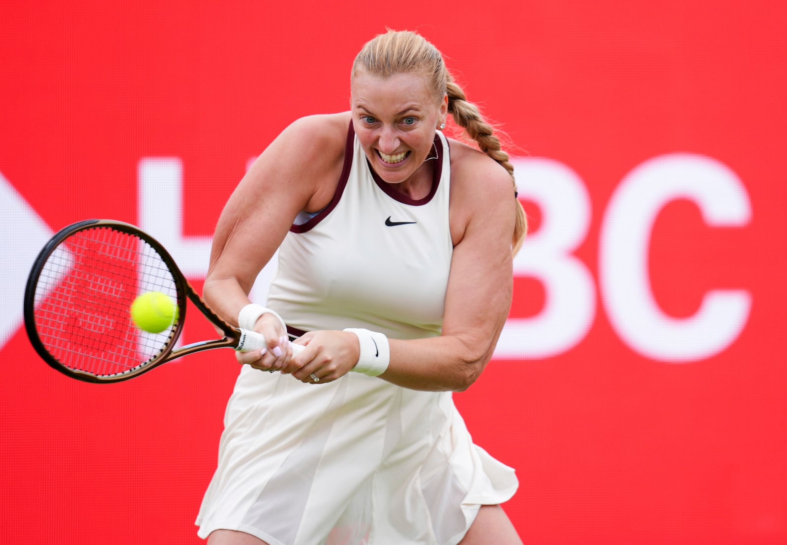 Czechia's Petra Kvitova hits the ball during her match against Brazil's Beatriz Haddad Maia, not pictured, on day one of the HSBC Championships at The Queen's Club, in London, Monday, June 9, 2025. (John Walton/PA via AP)